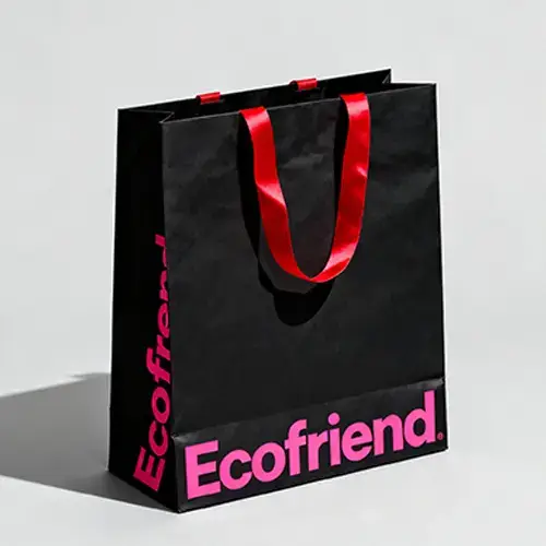 pink logo black shopping bags